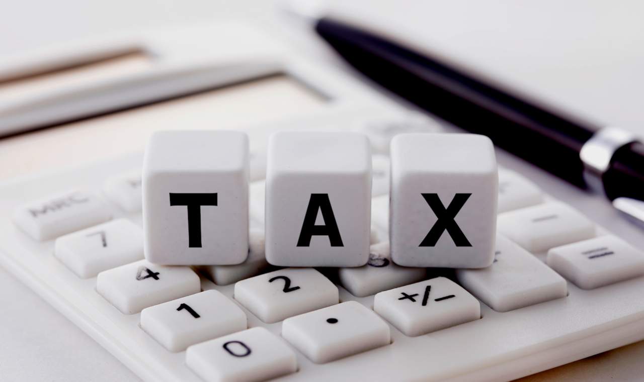 95 % or builders, developer failed to comply with the tax waiver terms